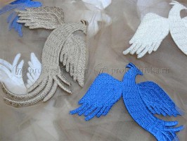 Машинная вышивка птиц на сетке