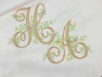 Машинная вышивка инициалов на скатертях